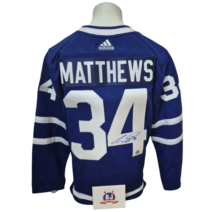 Official signed Adidas jersey - Auston Matthews home AJs coa