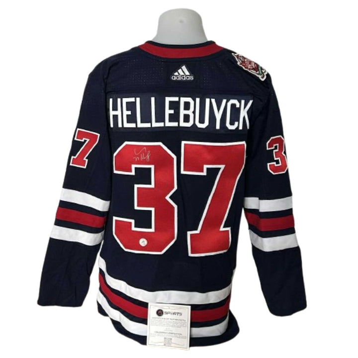 Chandail Officiel Autographié Adidas - Connor Hellebuyck 3e chandail